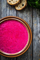 Beetroots soup on wooden table
