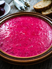 Beetroots soup on wooden table
