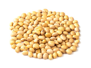 handful of dried soybeans closeup on white