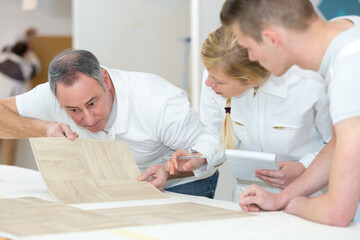 Fototapeta premium man looking at linoleum flooring