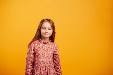 Girl isolated on yellow background