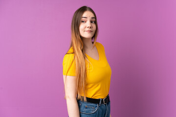 Young caucasian woman isolated on purple background . Portrait