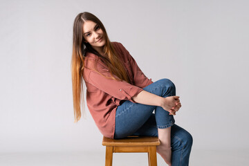 Young caucasian woman posing in studio