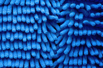 Close up image of new blue microfiber mop pad