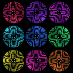 metal flat spiral on a black background in different lighting options. Abstract photography.