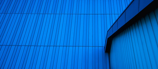Background with texture of metal cladding.Blue stripes of modern architecture, Blue mono tone of...