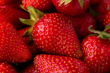 Strawberries top view. Strawberry harvest. Ripe strawberry close-up. Strawberry background.