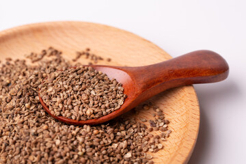 Anise seeds in a plate. Anise in a plate on a white background.