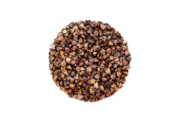 Isolate of unpeeled whole buckwheat seeds in the shape of a circle. Pseudocereal agricultural crop. View from above.