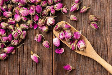 Dried rosebuds on the table close-up. Lots of dry rosebuds. Dried rose flowers. Dried roses. Rosebuds for decoctions.