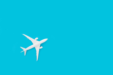 Airplane toy isolated on pastel blue background