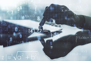 Double exposure of creative scientific formula concept with finger clicks on a digital tablet on...