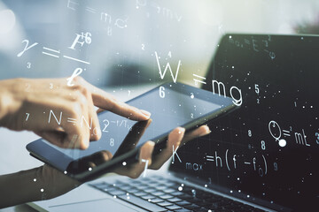Double exposure of creative scientific formula concept with finger clicks on a digital tablet on background, research and development concept