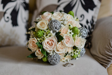 wedding bouquet and rings