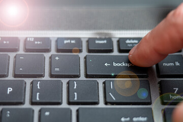 Laptop keyboard close up, backspace button pressing a lot of times on keyboard