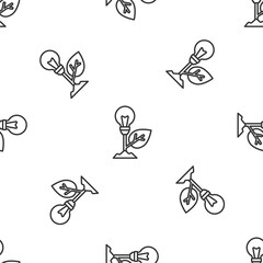 Grey line Light bulb with leaf icon isolated seamless pattern on white background. Eco energy concept. Alternative energy concept. Vector