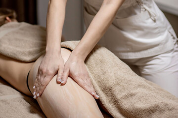 Legs and buttocks massage to reduce cellulite and phlebeurysm and preserve an healthy look. Skin and bodycare. Recovery