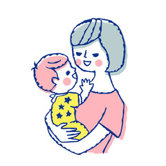 赤ちゃんを抱っこするママ