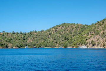 Fototapeta premium Gocek is famous for its natural beauty and crystal clear sea among the sailors not only in Turkey but also abroad, is surrounded by 12 islands in Turkey