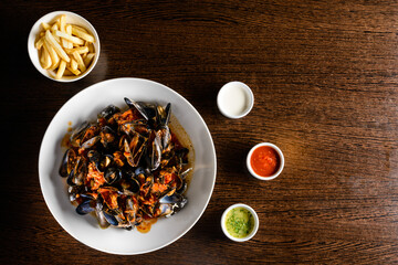 Delicious Shellfish Traditional Mussels with tomato sauce on the