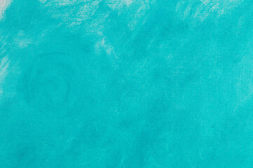 creative background, a spot of heavenly colored primer rubbed on the surface of a linen canvas, temporary object, close, toning