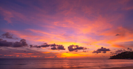 Landscape Long exposure of majestic clouds in the sky sunset or sunrise over sea with reflection in the tropical sea Beautiful cloudscape scenery Amazing light of nature Landscape