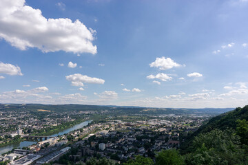 Aerial view of Trier on beautiful summer day with blue sky and clouds over Moselle river from viewpoint Marian column, Germany