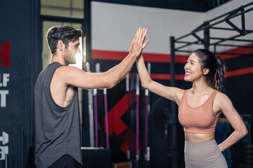 Sport athlete friend give high five before exercise at fitness stadium