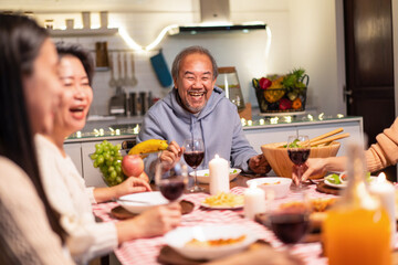 Happy Asian big family enjoy holiday party celebrate in house together