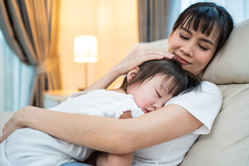  Mother hold and hug sleep baby kid girl daughter in arms with gently.