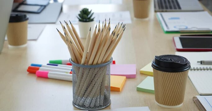 Meeting room Office laptop business financial document chart , graph on wooden table with coffee cup. Flat lay notebook computer laptop on office desk. No people business graph chart on meeting table