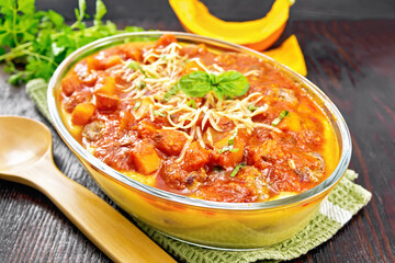 Porridge corn with meat and vegetables in roaster on table