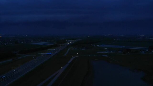 Series Of Thunderlight Over The Busy Road At Nighttime. static shot