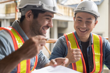 Team onsite of architecture inspector and discuss together and working at building site
