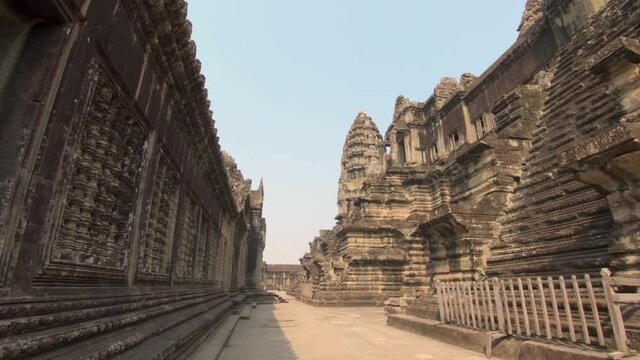 Slow walk through the ruins of the ancient temples of Angkor Wat in Cambodia