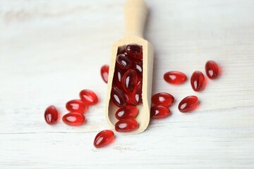 krill oil red gelatin capsules .omega fatty acids.Natural supplements and vitamins.Red capsules...