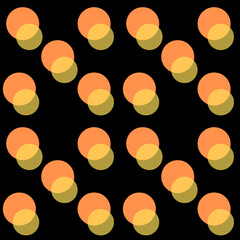 Pattern with black background with bright yellow and orange circles
