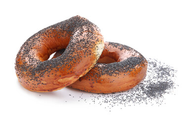 Sweet bagels with poppy seeds on white background