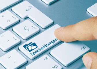 Fototapeta premium Speicherlösungen - Wort auf blauen taste.