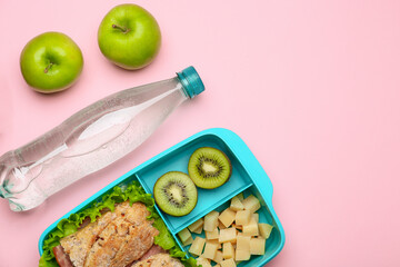 Lunchbox with tasty food on color background