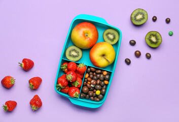 Lunchbox with tasty food on color background
