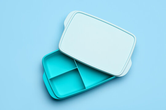 Empty school lunchbox on color background