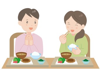 仲良く食卓を囲む夫婦