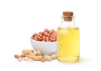 Peanut oil with peanuts isolated on white background.