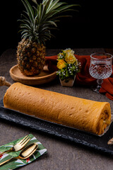 Delicious swill roll, roll cake or bolu gulung with pineapple jam 

Bolu Gulung is a sponge cake that is baked using a shallow pan, filled with jam or butter cream and then rolled. 