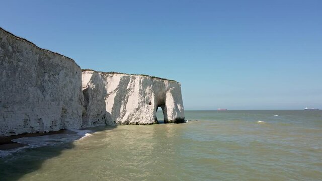 Kingsgate Bay Sea Arch on sunny day