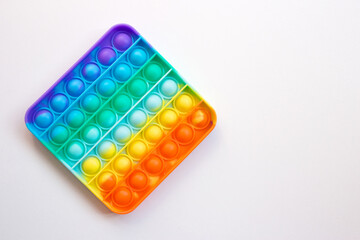Colorful rainbow anti-stress fidget push pop it sensory toys for children. Simple dimple. 