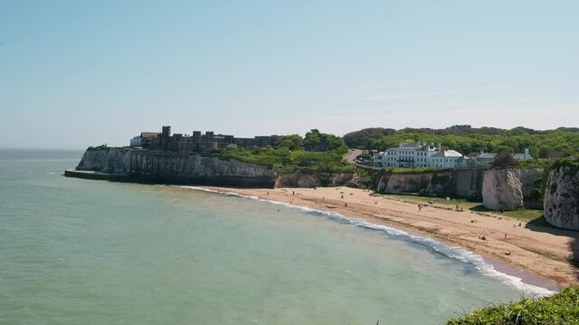 Kingsgate Castle on the top of the cliffs at the Kingsgate beach on sunny day