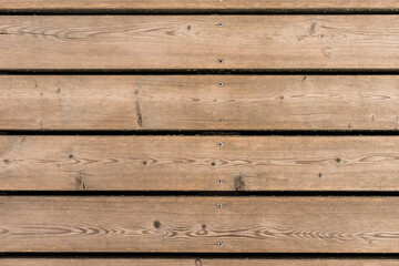 Fototapeta premium Old rustic light bright wooden texture. Close view of wooden plank table.