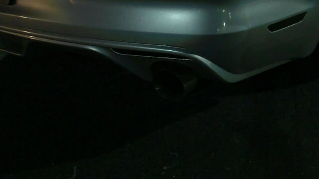 view of high performance exhaust pipe with police strobe light on it